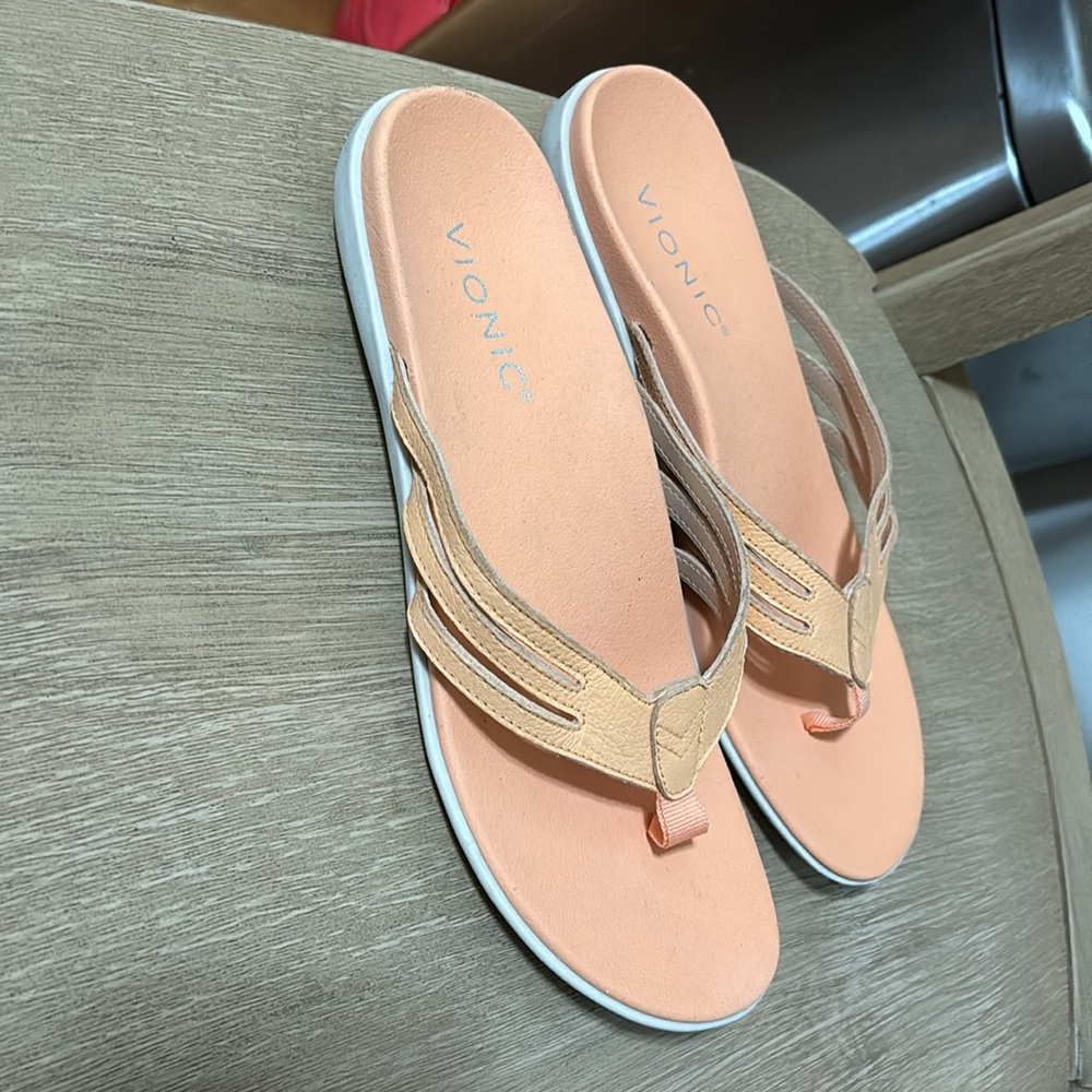 Vionic orange Flip flops size 7.
Sample pair no box 10 inches length
A-2 - Picture 2 of 5